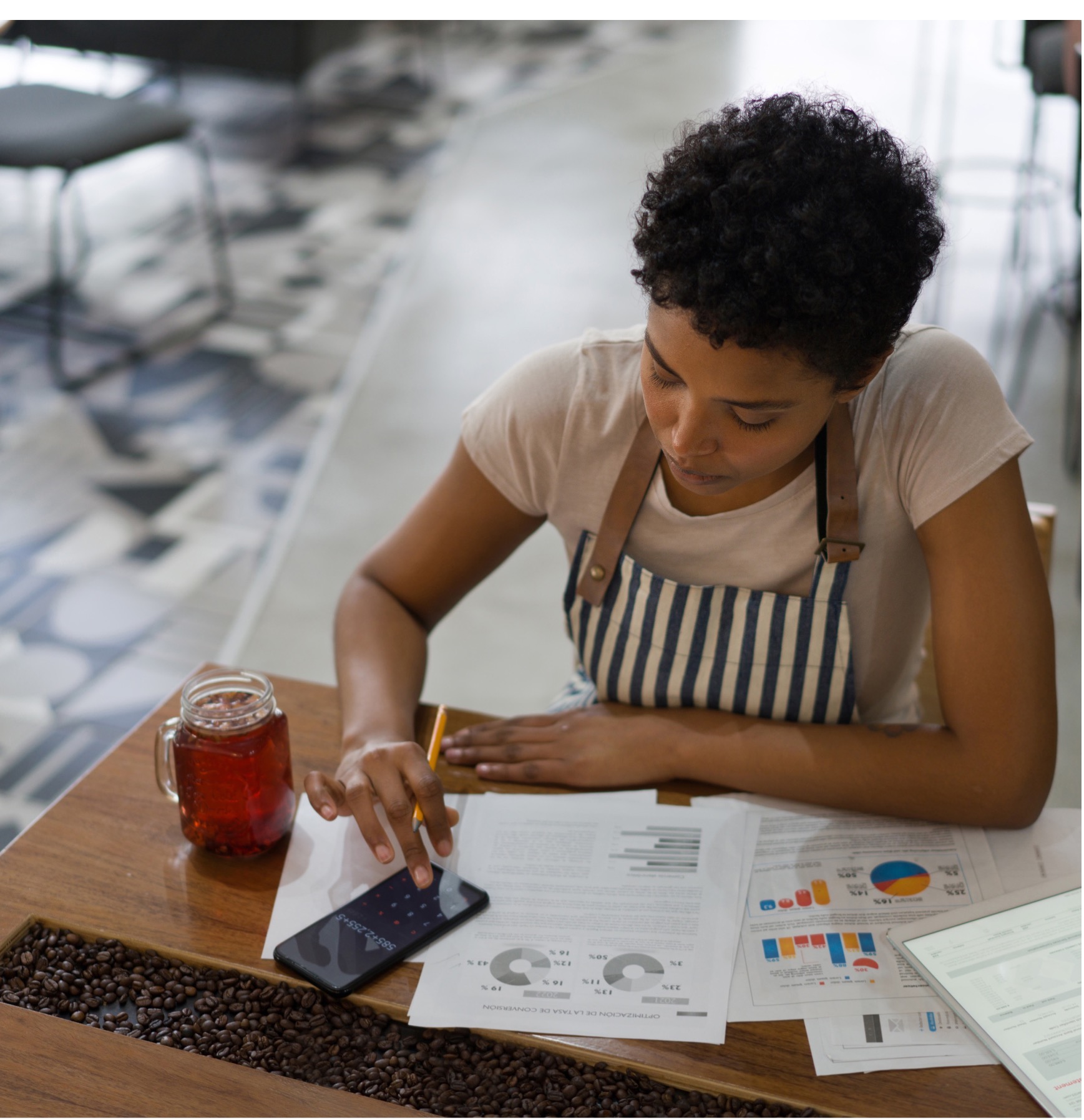 restaurant worker crunching numbers